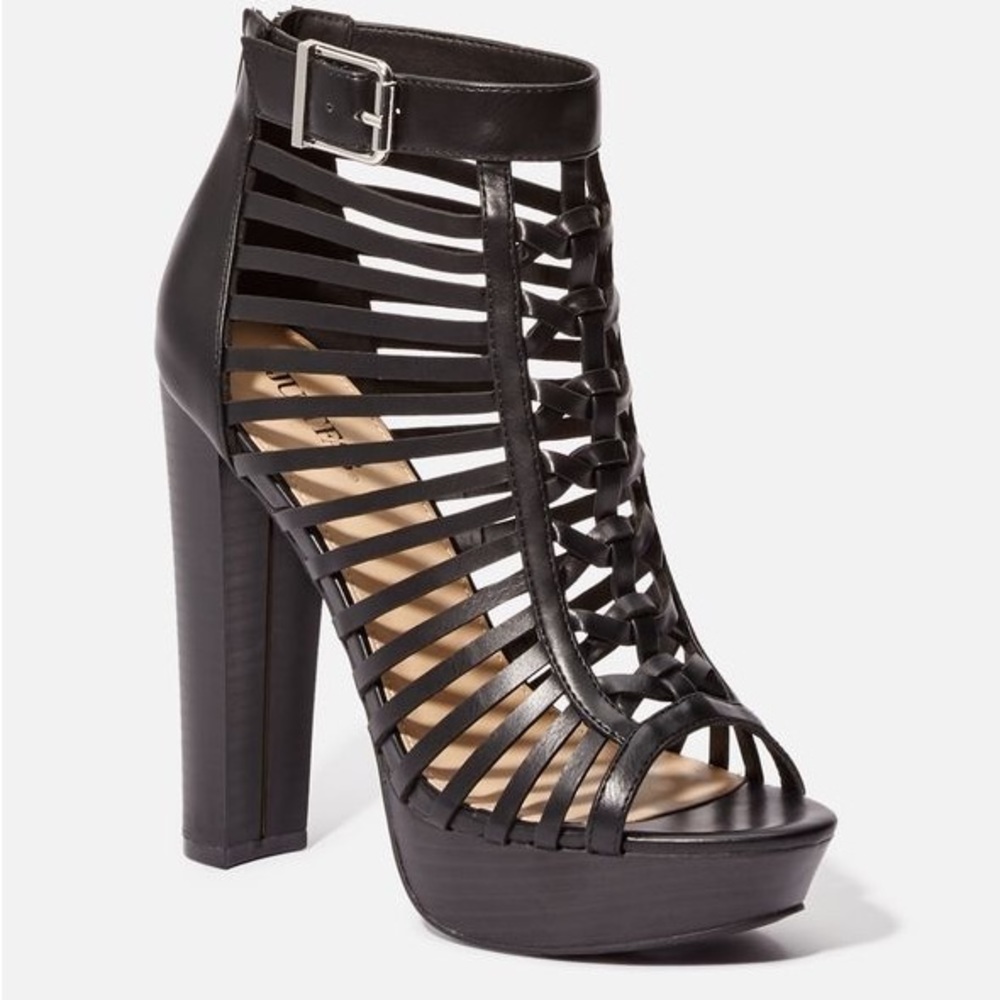 Sky high black dress sandal.
